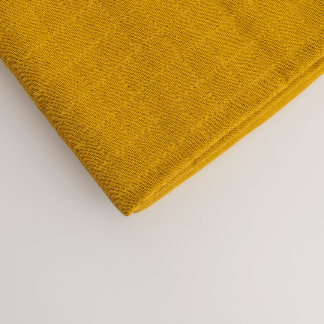 Zoey Swaddle Spicy Mustard Organic Muslin Swaddle